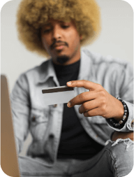 Person holding credit card